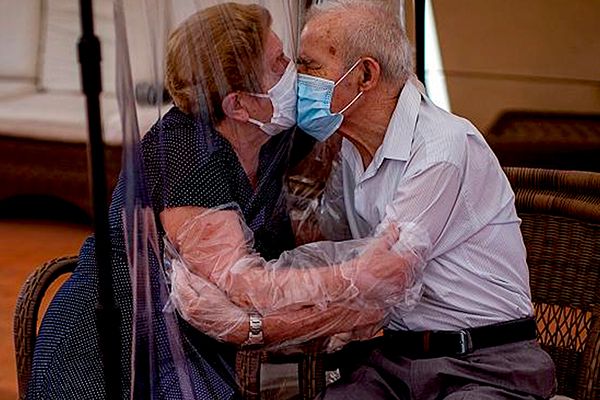 Spanish Nursing Home Allows Hugs Through Plastic Screen