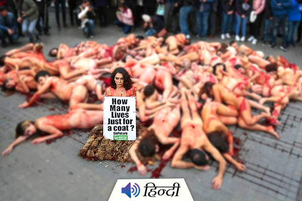 Spain: Animal Rights Activists Protests Naked Against Fur